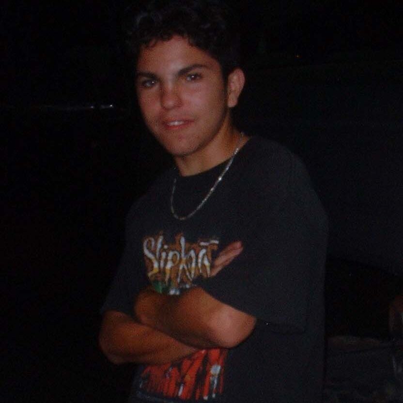 Charles_2001 Lee Webster's son Charles, leaning on a big tire, October 18th, 2001.