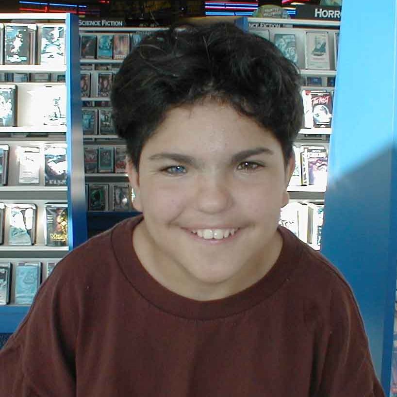 Charles_at_the_video-store Lee Webster's son Charles, at the video store. Scanned picture, not sure of the date.