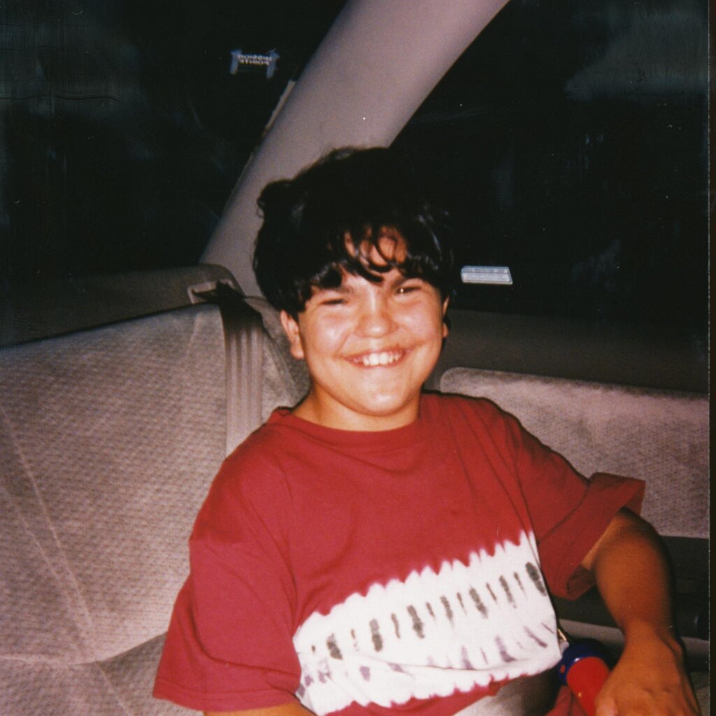 Charles_in_the_car_1 Lee Webster's son Charles, way back, maybe 1995. Scanned picture so no good date.