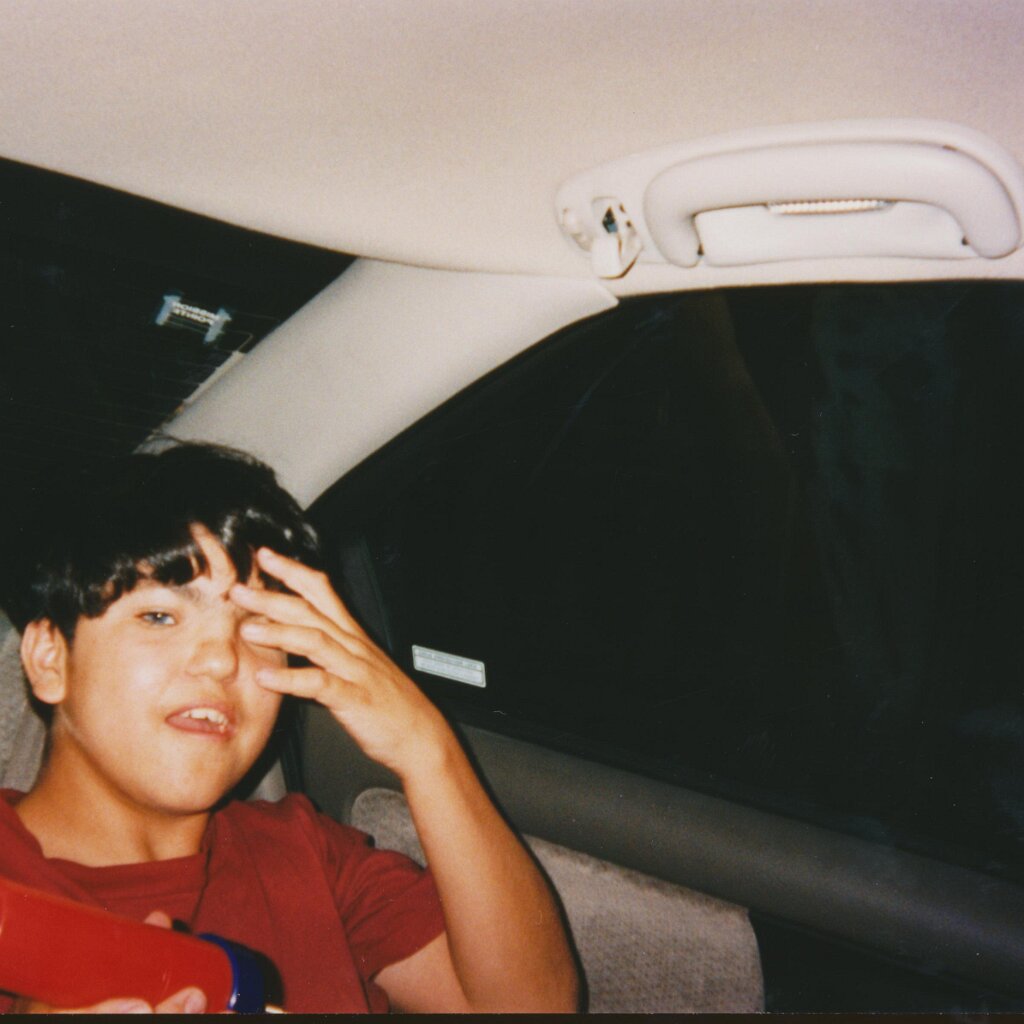 Charles_in_the_car_2 Lee Webster's son Charles, way back, maybe 1995. Scanned picture so no good date.