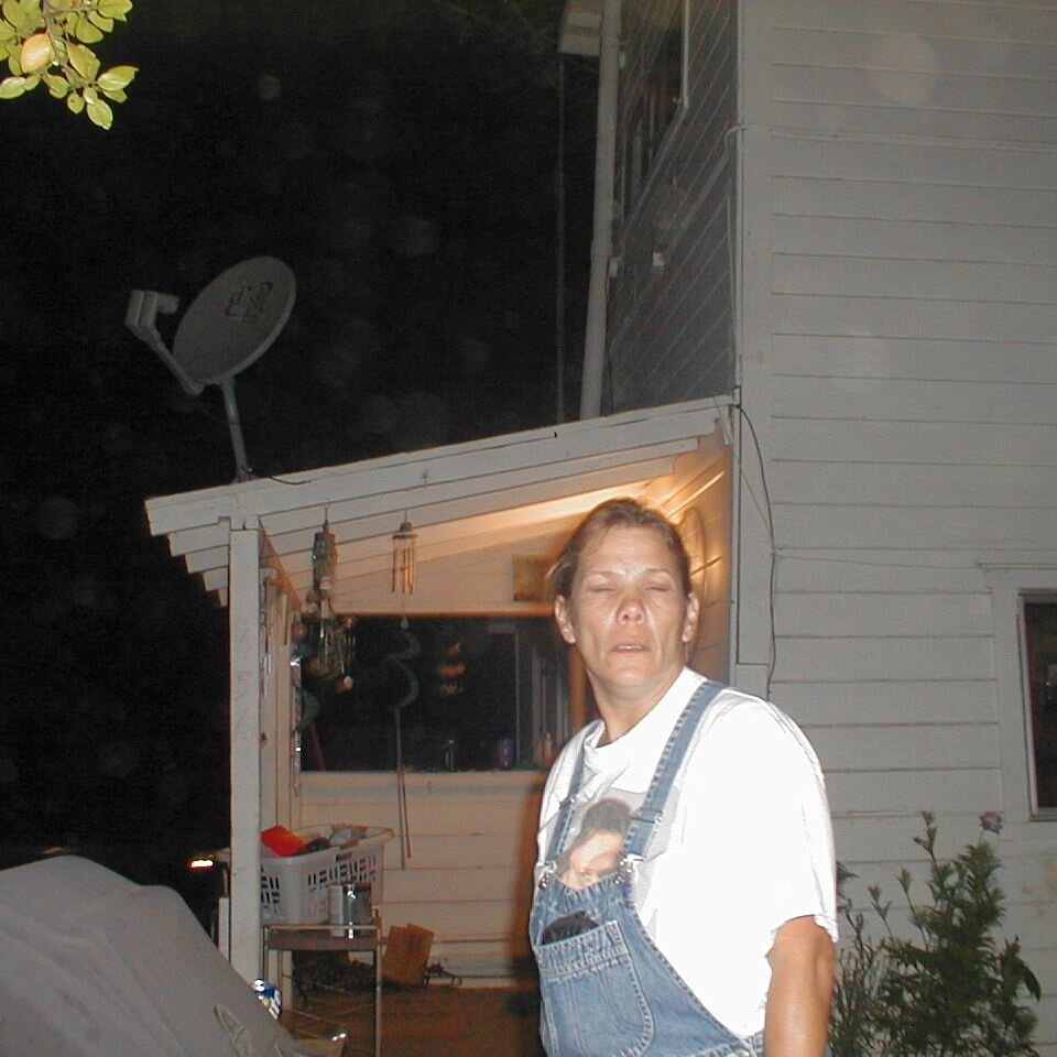 2000-06-29x22-19_Lee_squint Lee Webster, Charlie Jackson's ol' lady, caught in a squint. At the house on Ferguson Drive in Mountain View CA. It's torn down now.