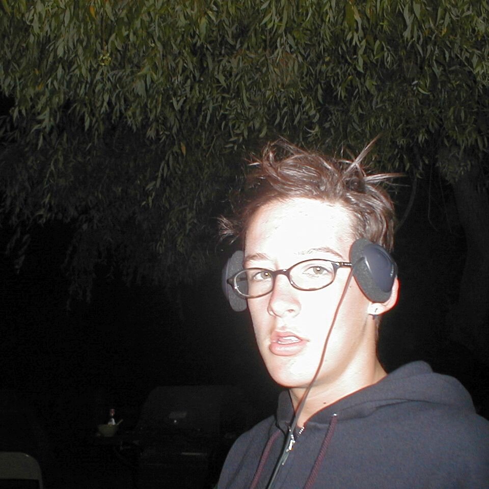 2000-07-01x20-07_Mike_headphones Mike checking out some tunes.