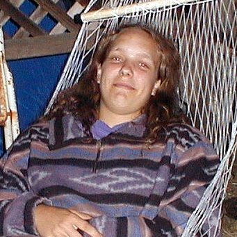 2000-06-27x18-42-13_Tracy_hammock Tracy in repose on a hammock after a long day. At the house on Ferguson Drive in Mountain View CA. It's torn down now.