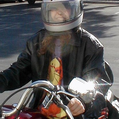 2000-07-02x12-02-13_Tracy_Harley Tracy on my bike at mercanti systems in Sunnyvale, CA, the Sunday after the Hollister run. No, I didn't let her drive it.