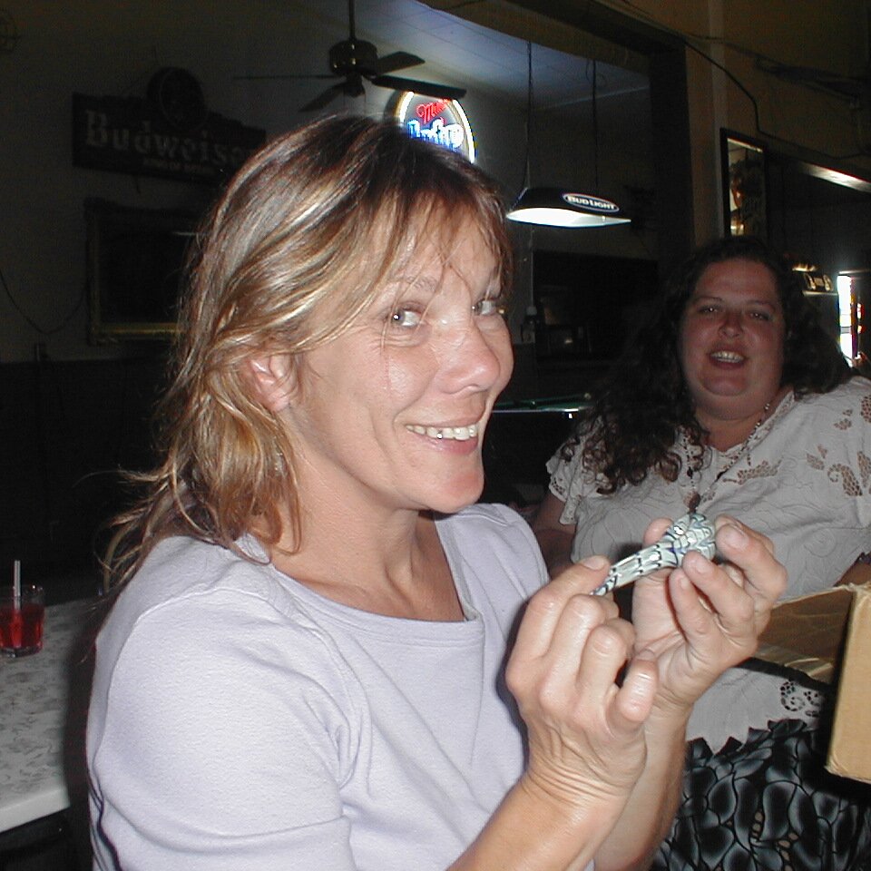 2000-07-03x17-12-21_Lee_Webster_birthday Lee Webster with a gift at her birthday party in the Bourbon One Lounge in Sunnyvale CA. True time and date.