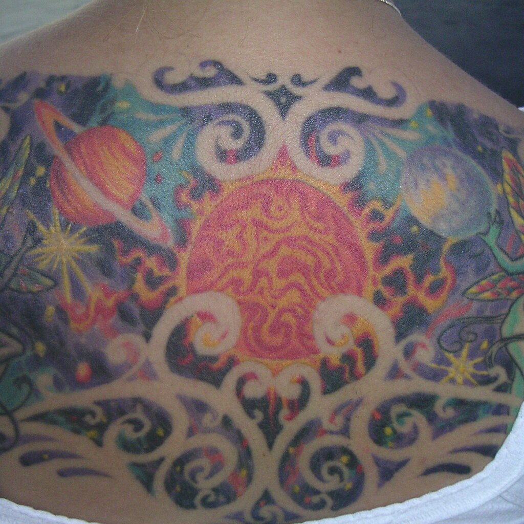 Jam_session_2004-08-08x04-58-16 A nice tat on a gal at Charlie Jackson's home in the barn at 12780 Clayton Road, San Jose, CA. (It's a roofer now.)