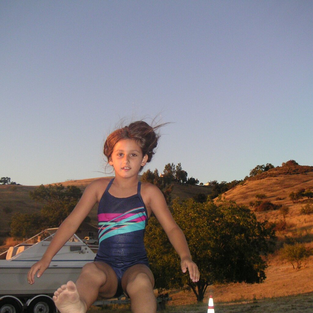 Jam_session_2004-08-08x04-59-03 Megan on the trampoline at Charlie Jackson's home in the barn at 12780 Clayton Road, San Jose, CA. (It's a roofer now.)